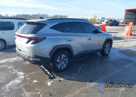 2022 Hyundai Tucson Hybrid Blue z USA, uszkodzony, nr VIN KM8JBCA15NU014088